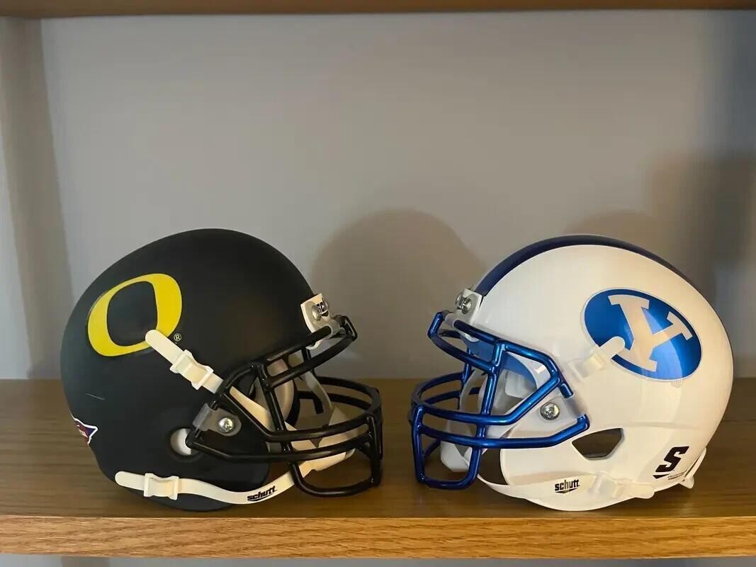 Brigham Young and Oregon Football Helmets facing each other