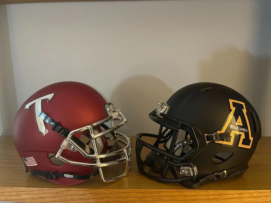 Troy and Appalachian state college football helmets