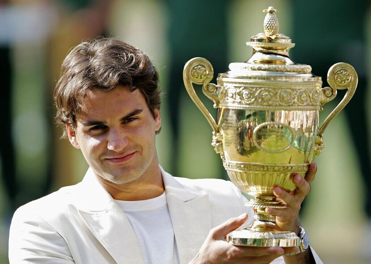 Roger Federer holding the trophy
