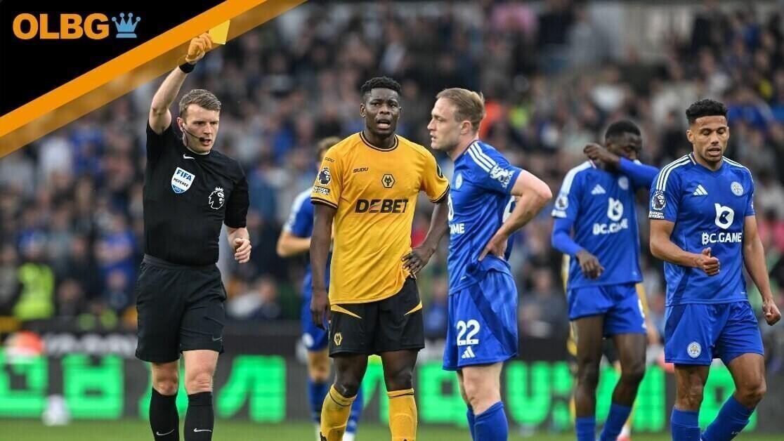 Referee Samuel Barrott yellow cards Leicester City's Oliver Skipp during the Premier League match at Molineux Stadium, Wolverhampton
