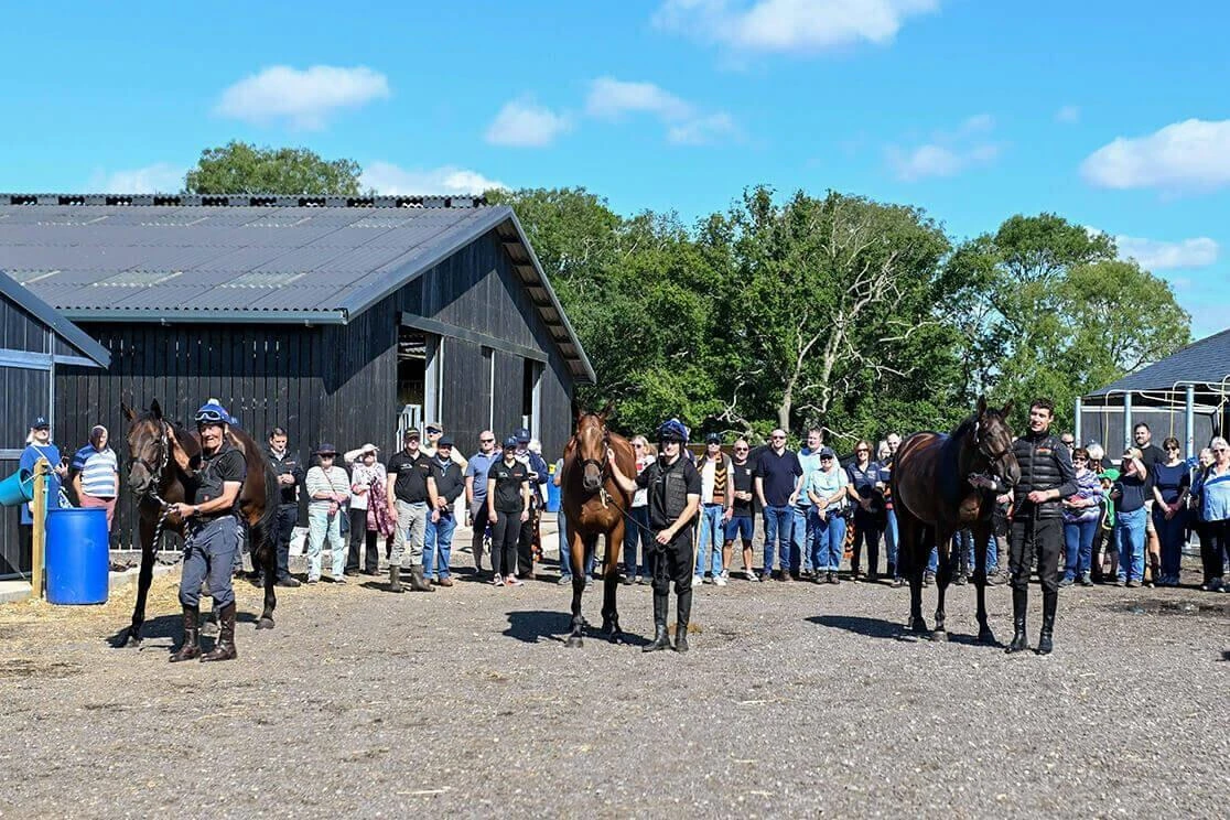 Members of the OLBG Racing Club enjoying a tour of Harry Derham Racing and seeing the clubs horses Lario, Nordic Tiger and Viyanni