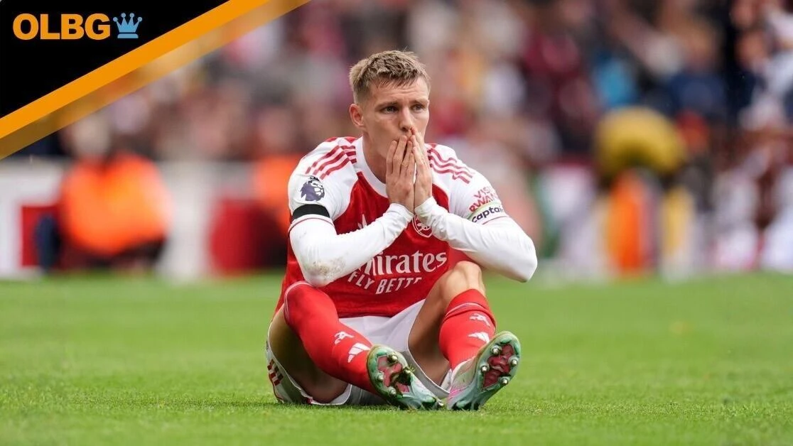 Arsenal's Martin Odegaard reacts after going down injured after a challenge during the Premier League match at the Emirates Stadium, London. Picture date: Saturday October 4, 2025